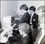 Five Boys Collaborate While Using a Computer at Berkeley Preparatory School in Tampa, Florida by Skip Gandy