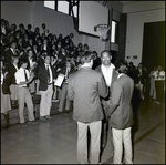 A Man Shakes Hands With Two Students at Berkeley Preparatory School in Tampa, Florida by Skip Gandy