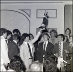 A Student Athlete Holds His Trophy High at Berkeley Preparatory School in Tampa, Florida by Skip Gandy