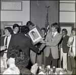 Students Present a Faculty Member With a Signed Portrait at Berkeley Preparatory School in Tampa, Florida by Skip Gandy