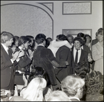 An Honored Faculty Member Embraces His Students at Berkeley Preparatory School in Tampa, Florida, A by Skip Gandy