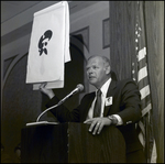 Gordon French of the Berkeley Preparatory School Dads Club Holds up an Illustration in Tampa, Florida, A by Skip Gandy