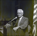 A Man Speaks at a Podium During an Awards Ceremony at Berkeley Preparatory School in Tampa, Florida, B by Skip Gandy