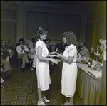 A Woman Presents a Girl With an Award at Berkeley Preparatory School in Tampa, Florida, B by Skip Gandy