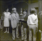 A Boy Holds His Soccer Trophy Proudly at Berkeley Preparatory School in Tampa, Florida