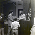 A Boy Shakes Hands With the Man Presenting His Award at Berkeley Preparatory School in Tampa, Florida