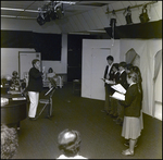 A Chorus of Six Musicians Sing for an Audience at Berkeley Preparatory School in Tampa, Florida