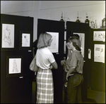 A Student Discusses Her Illustrations During the Spring Art Festival at Berkeley Preparatory School in Tampa, Florida, B by Skip Gandy