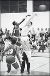 Two Opposing Players Collide Midjump During a Boy's Basketball Game at Berkeley Preparatory School in Tampa, Florida, A by Skip Gandy