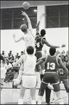 Two Opposing Players Collide Midjump During a Boy's Basketball Game at Berkeley Preparatory School in Tampa, Florida, C by Skip Gandy