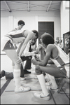 A Boy's Basketball Coach Kneels to Consult His Team During a Game at Berkeley Preparatory School in Tampa, Florida, C