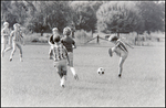 A Player Kicks Widely During a Children's Soccer Game at Berkeley Preparatory School in Tampa, Florida, A by Skip Gandy