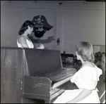 Two Students Sing and Play Piano During the June Commencement at Berkeley Preparatory School in Tampa, Florida, B by Skip Gandy