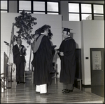 Two Administrators Shake Hands During the June Commencement at Berkeley Preparatory School in Tampa, Florida by Skip Gandy