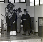 An Administrator Is Gifted With a Plaque During Commencement at Berkeley Preparatory School in Tampa, Florida by Skip Gandy