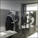 School Officials and Parents Chat Prior to Commencement at Berkeley Preparatory School in Tampa, Florida by Skip Gandy