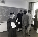 A School Official Reviews Seating Arrangements Prior to Commencement at Berkeley Preparatory School in Tampa, Florida by Skip Gandy