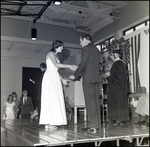 A Graduate Shakes Hands With an Official During Commencement at Berkeley Preparatory School in Tampa, Florida, B by Skip Gandy