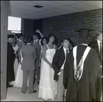 Graduating Students Line up After the June Commencement at Berkeley Preparatory School in Tampa, Florida, D by Skip Gandy