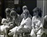 Students Sit on a Planter After Receiving Their Gym Clothes at Berkeley Preparatory School in Tampa, Florida by Skip Gandy