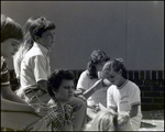 Students Write and Chat Amongst Themselves in the Courtyard at Berkeley Preparatory School in Tampa, Florida by Skip Gandy