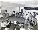 Students Dance Before a Chorus During Music Class at Berkeley Preparatory School in Tampa, Florida, B by Skip Gandy