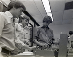 Three Boys Operate a Circuit Board at Berkeley Preparatory School in Tampa, Florida, B by Skip Gandy