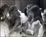 Five Girls Appreciate a Small Bouquet of Flowers at Berkeley Preparatory School in Tampa, Florida, B by Skip Gandy