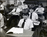 Children Smile at the Camera While in Class at Berkeley Preparatory School in Tampa, Florida, B by Skip Gandy