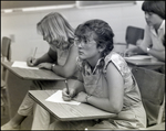 A Girl Listens Intently During Class at Berkeley Preparatory School in Tampa, Florida, B by Skip Gandy