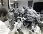 A Teacher Shows His Students Two Lenses During Class at Berkeley Preparatory School in Tampa, Florida, B by Skip Gandy