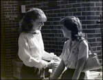 Two Girls Chat in a Breezeway at Berkeley Preparatory School in Tampa, Florida by Skip Gandy