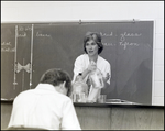 A Science Teacher Demonstrates an Experiment With a Large Beaker at Berkeley Preparatory School in Tampa, Florida by Skip Gandy