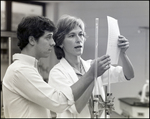 A Student and His Science Teacher Discuss His Findings at Berkeley Preparatory School in Tampa, Florida, A by Skip Gandy