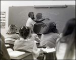 A Teacher Draws a Diagram of a Neuron at Berkeley Preparatory School in Tampa, Florida, A by Skip Gandy