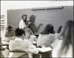 A Teacher Draws a Diagram of a Neuron at Berkeley Preparatory School in Tampa, Florida, B by Skip Gandy