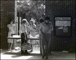 Students Visit a Snack Table at Berkeley Preparatory School in Tampa, Florida, A by Skip Gandy