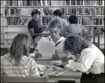 Three Girls Study in the Library at Berkeley Preparatory School in Tampa, Florida, B by Skip Gandy