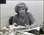 A Teacher Looks up From Her Desk at Berkeley Preparatory School in Tampa, Florida by Skip Gandy