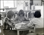 Three Students Study at a Table in the Library at Berkeley Preparatory School in Tampa, Florida, B by Skip Gandy