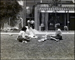 Three Girls Study in the Grass Outside Berkeley Preparatory School in Tampa, Florida, A by Skip Gandy