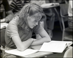 A Girl Reads Quietly in Class at Berkeley Preparatory School in Tampa, Florida by Skip Gandy