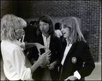 A Girl Gestures Animatedly to Her Two Friends at Berkeley Preparatory School in Tampa, Florida by Skip Gandy