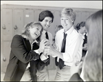 Three Friends Clasp Hands in Comradery at Berkeley Preparatory School in Tampa, Florida by Skip Gandy