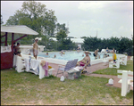 Adults Swim in and Lounge by a Community Pool in Beverly Hills, Florida, B