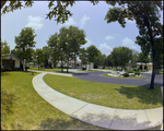 Three Houses Sit on a Cul-de-sac With a Fountain in the Center in Beverly Hills, Florida, C by Skip Gandy