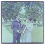 Man and Woman Accept Award for Rolling Oaks Corporation in Beverly Hills, Florida, A by Skip Gandy