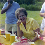 Woman Laughs Over Plate of Watermelon in Beverly Hills, Florida by Skip Gandy