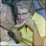 Woman Eats Watermelon Slice in Beverly Hills, Florida, B by Skip Gandy