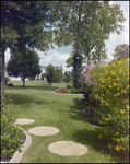 Lush Garden With Round Stepping Stones in Beverly Hills, Florida, A by Skip Gandy